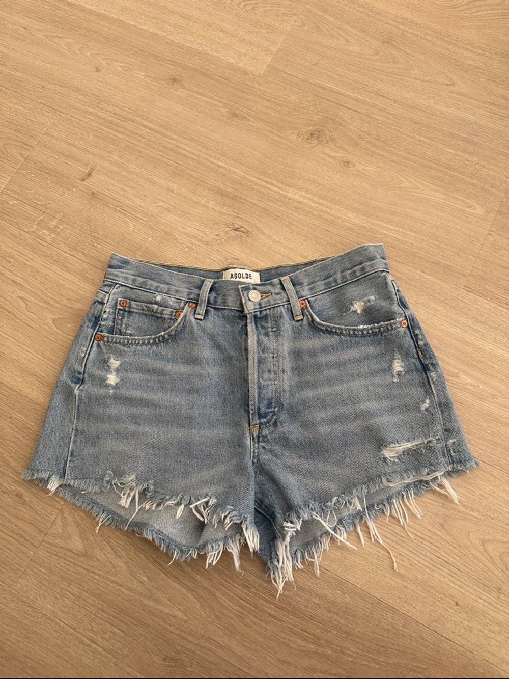 Agolde Light Wash Frayed Hem Denim Shorts